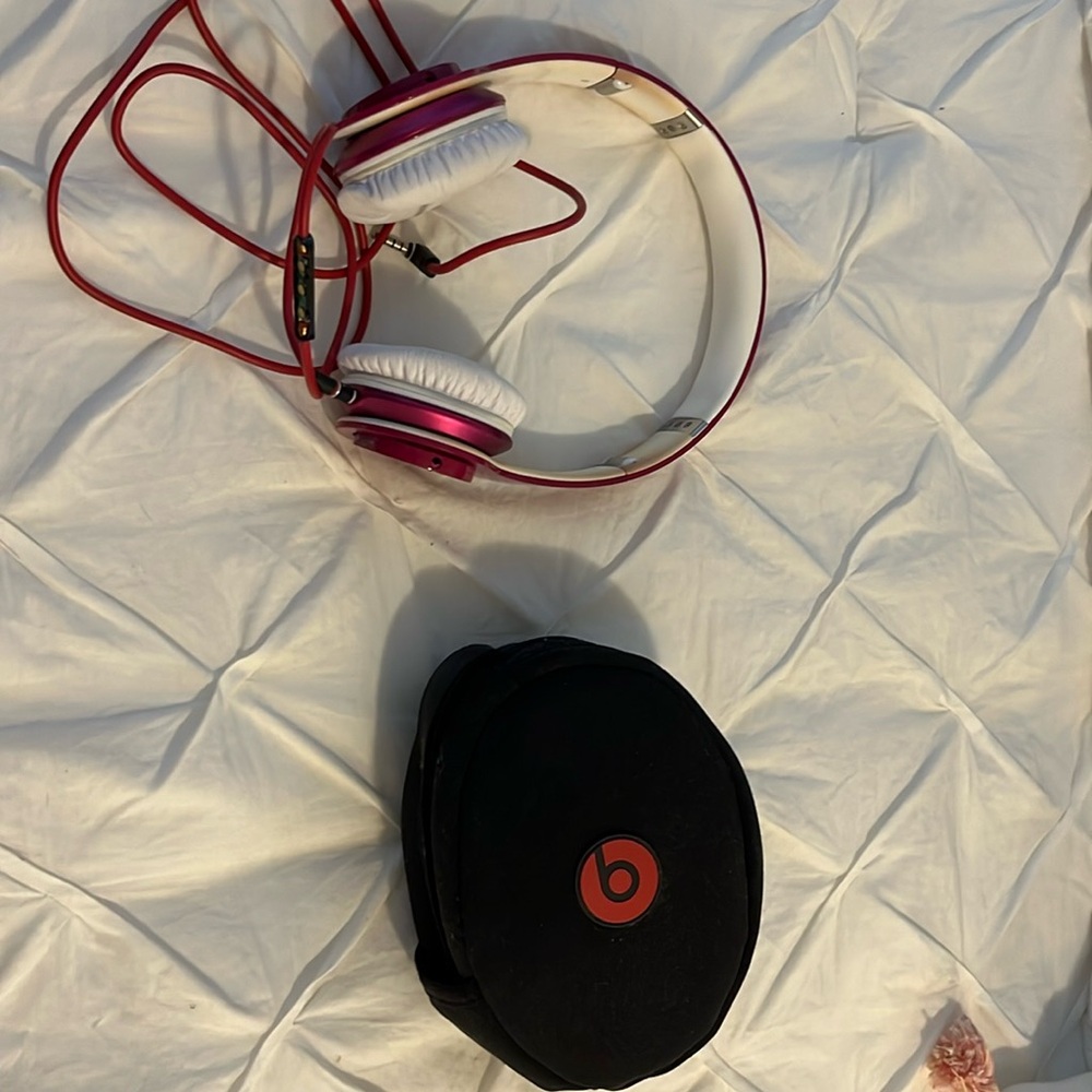 Beats by Dr.Dre dark pink.  Gently used.with case
